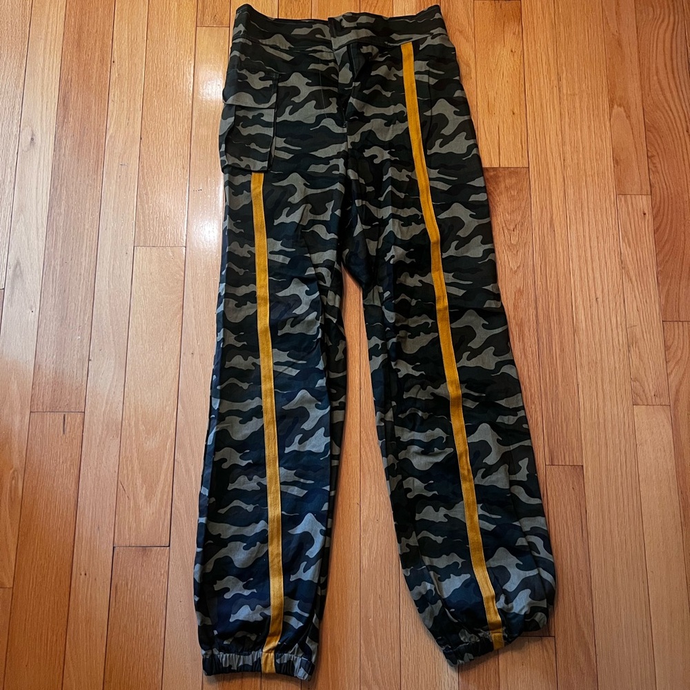 Naked Wardrobe Cargo pants elastic waistband with orange stripe.